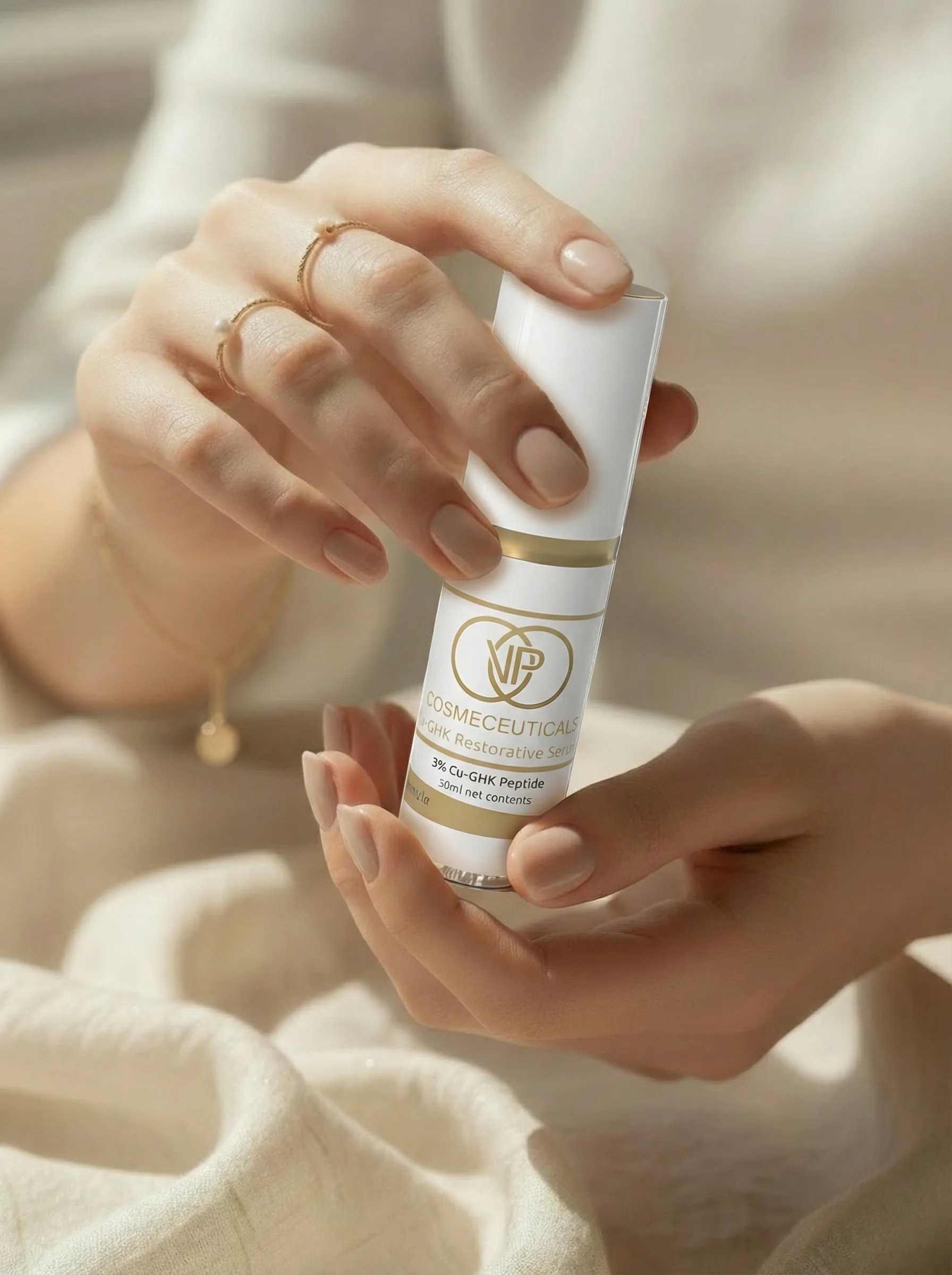 Hands holding the VP Cosmo 3% Cu-GHK copper peptide serum